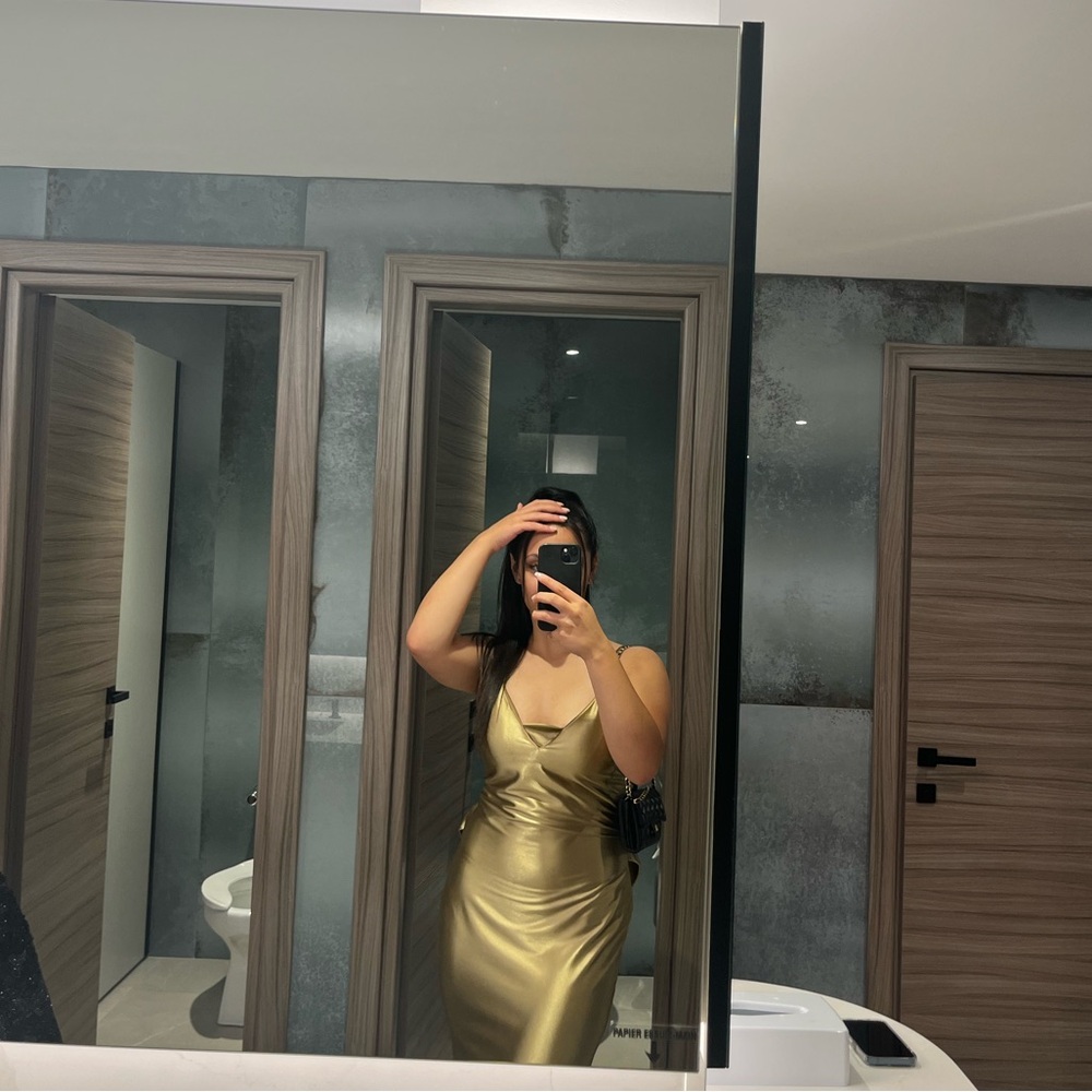 Gold prom dress. Only wore once for prom. It needs a clean and that’s it.